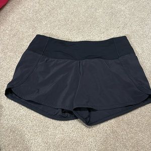 Lululemon mid rise 4inch speed up shorts black size 4